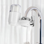 Water filter attached to a faucet in the background.