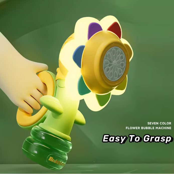 Colorful flower-shaped bubble machine held by a hand on a green background