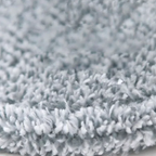 Close-up of a textured gray fabric surface
